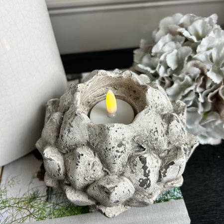 Stone artichoke candle holder