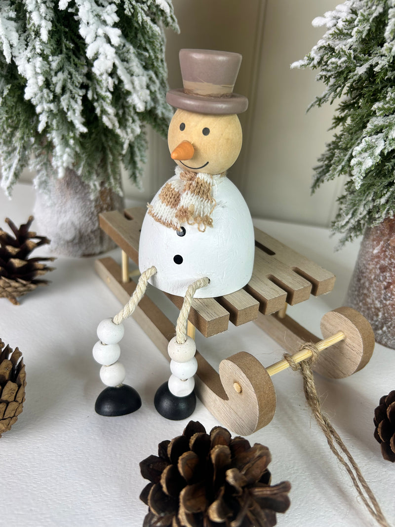 Sitting metal snowman 11cm
