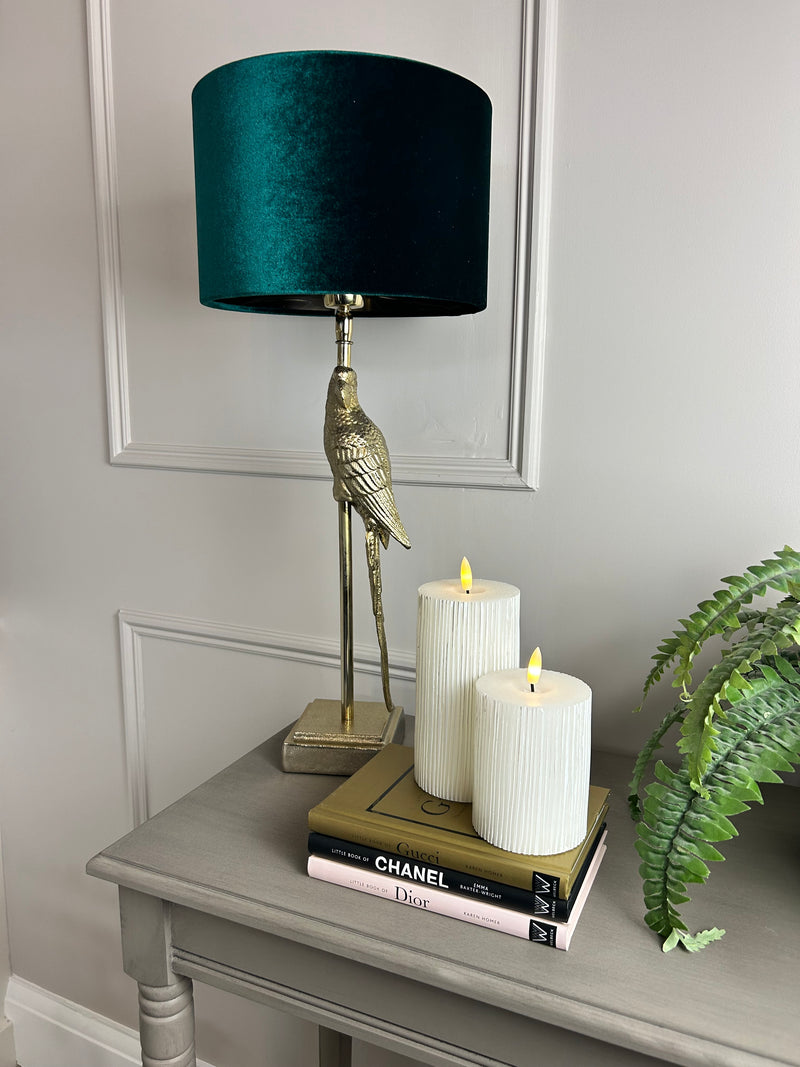 Gold parrot lamp with emerald green shade