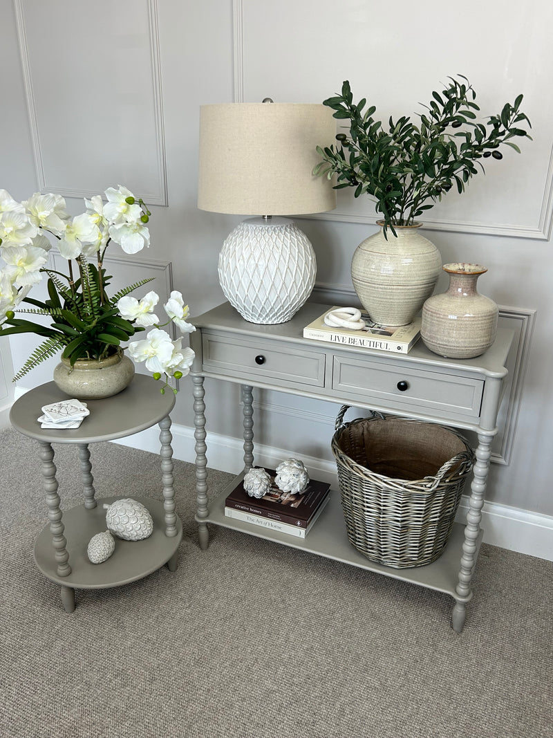 Neutral taupe round side table textures beaded leg