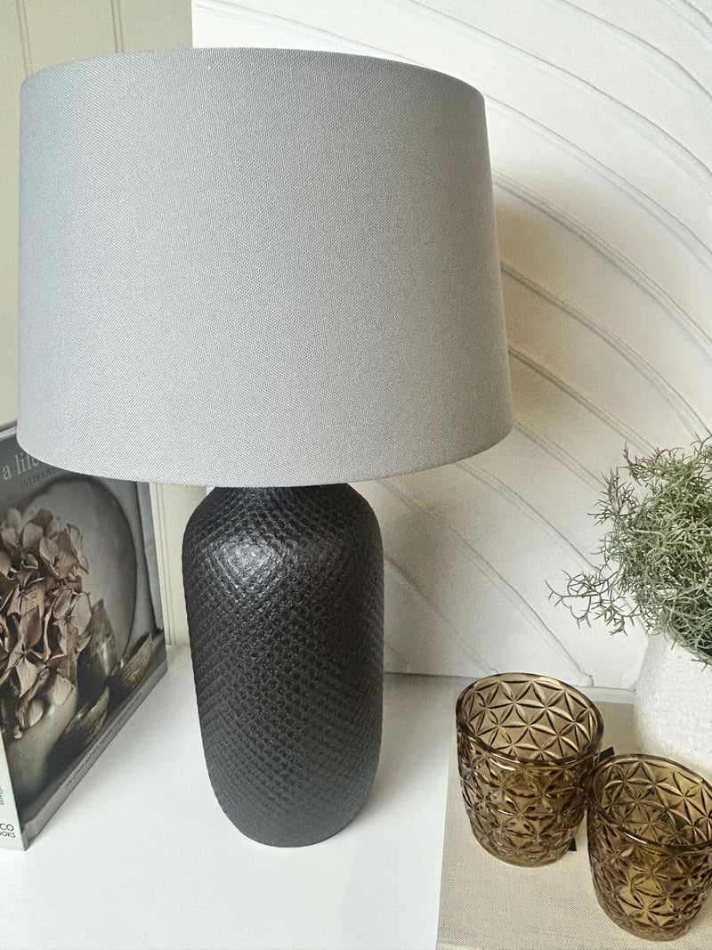 Black textured ceramic lamp with shade