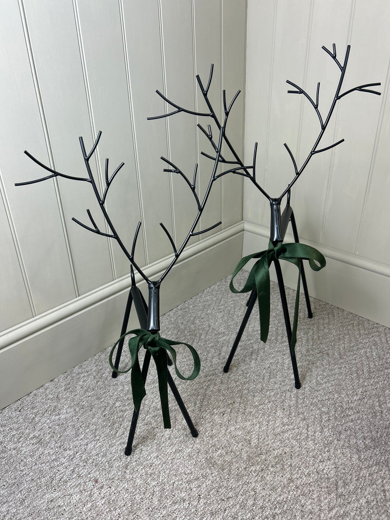 Set of two black metal reindeers 67cm