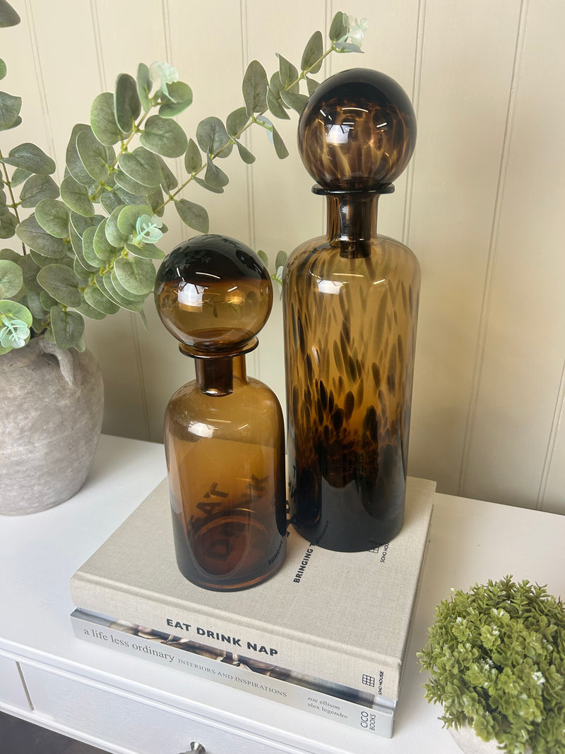 Large tortoise shell print glass bottle with top lid