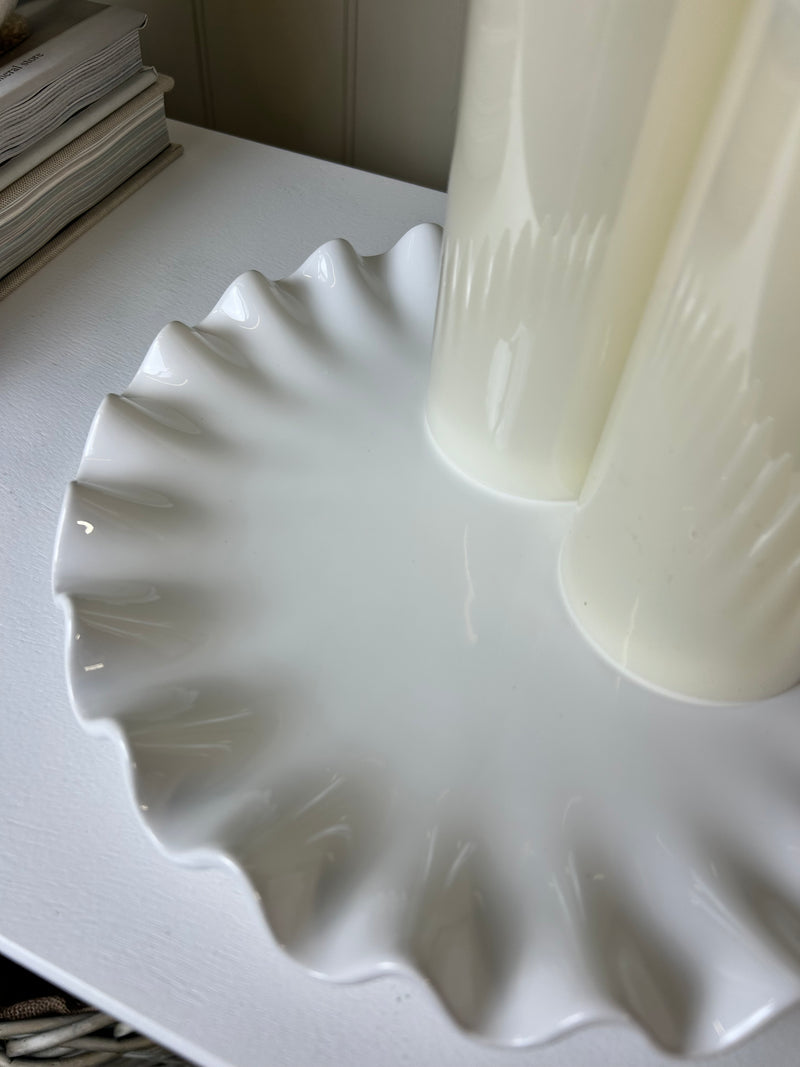 Ruffled white ceramic candle plate