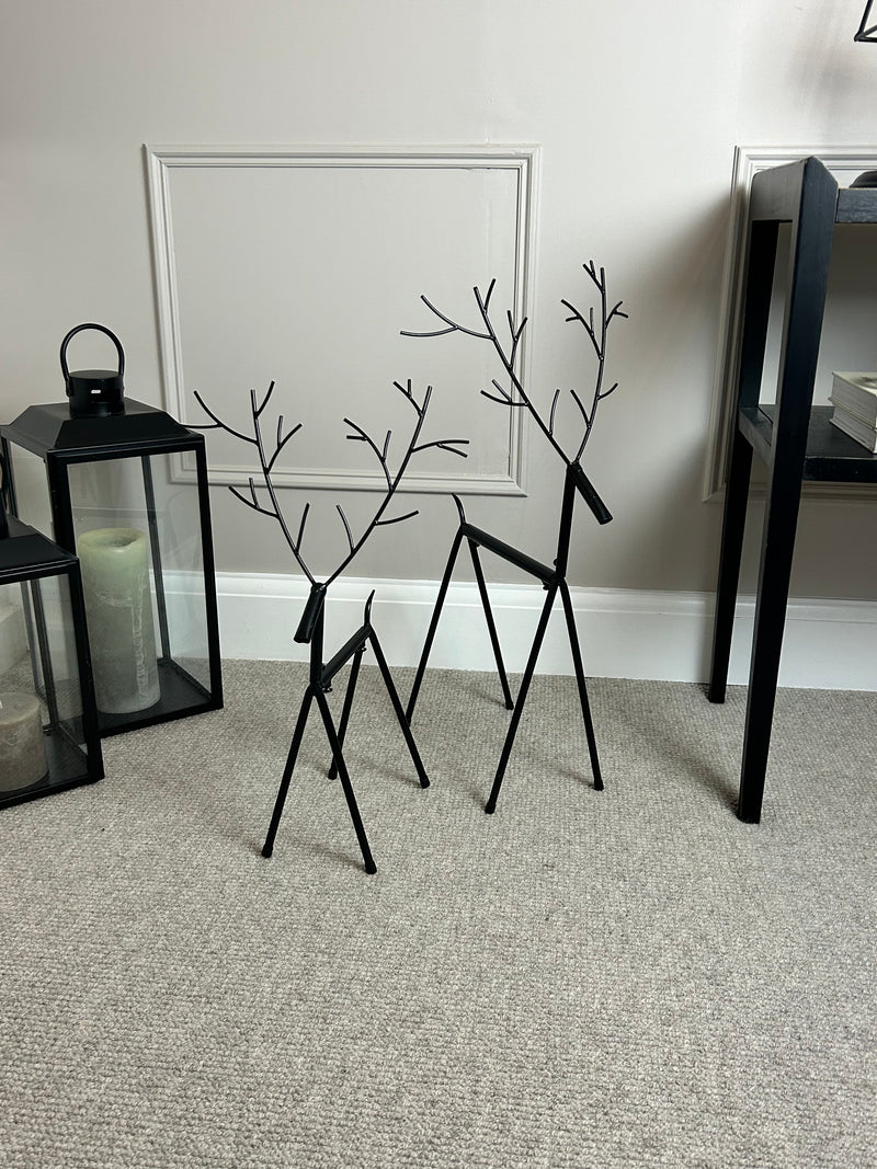 Set of two black metal reindeers 67cm