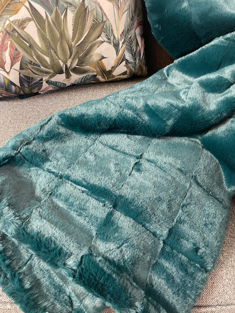 Emerald green fur throw