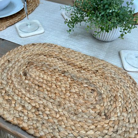 Set of four seagrass woven oval placemats