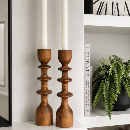 Pair of wooden tapered brown wood candle sticks
