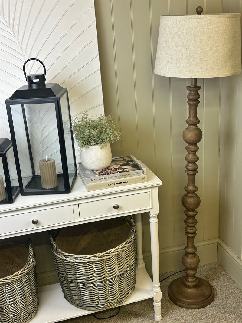 Wooden shaped floor lamp with linen shade
