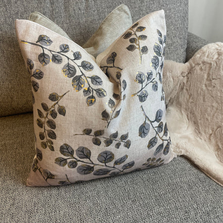 Gold leaf detail luxe cushion