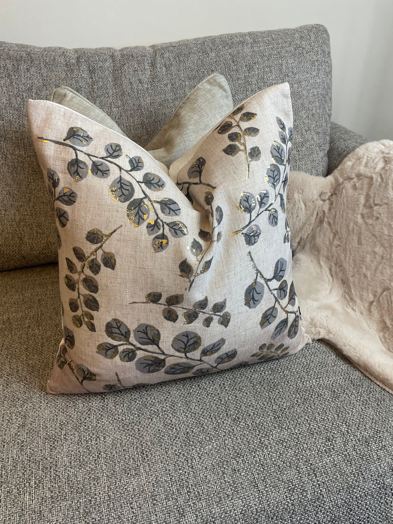 Gold leaf detail luxe cushion