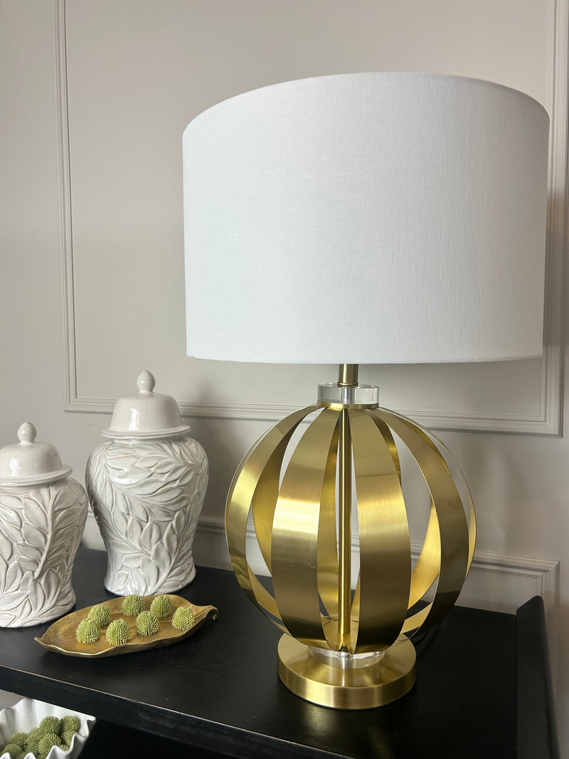 Gold metal round chunky lamp with white shade