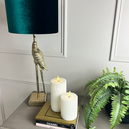 Gold parrot lamp with emerald green shade