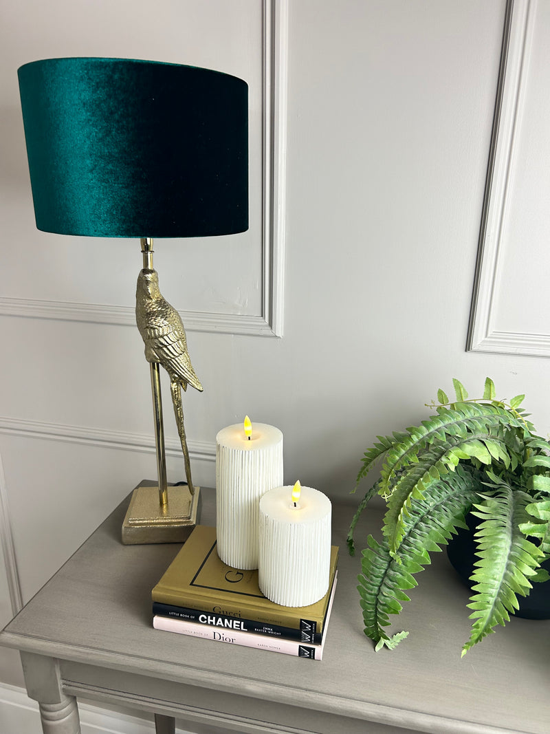 Gold parrot lamp with emerald green shade