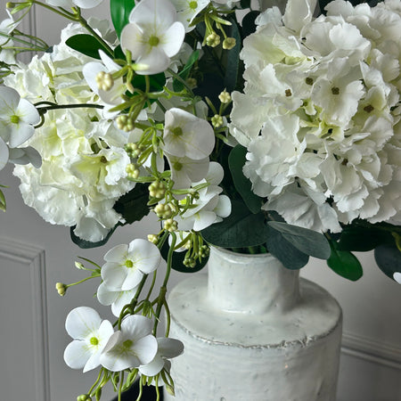 Eucalyptus, white hydrangeas and Florence spray stem arrangement