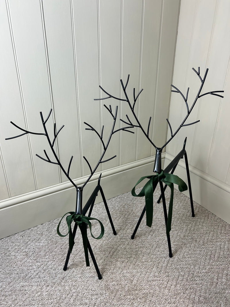Set of two black metal reindeers 67cm