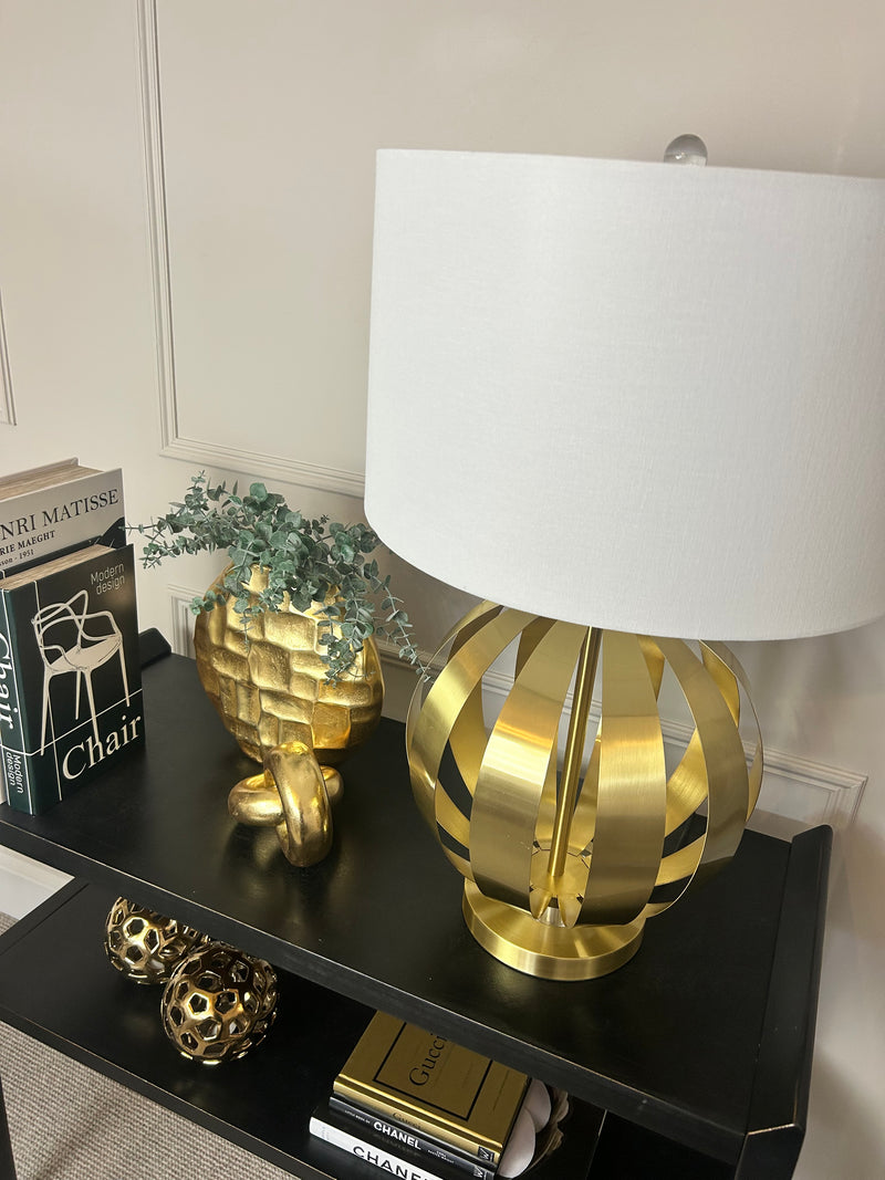Gold metal round chunky lamp with white shade