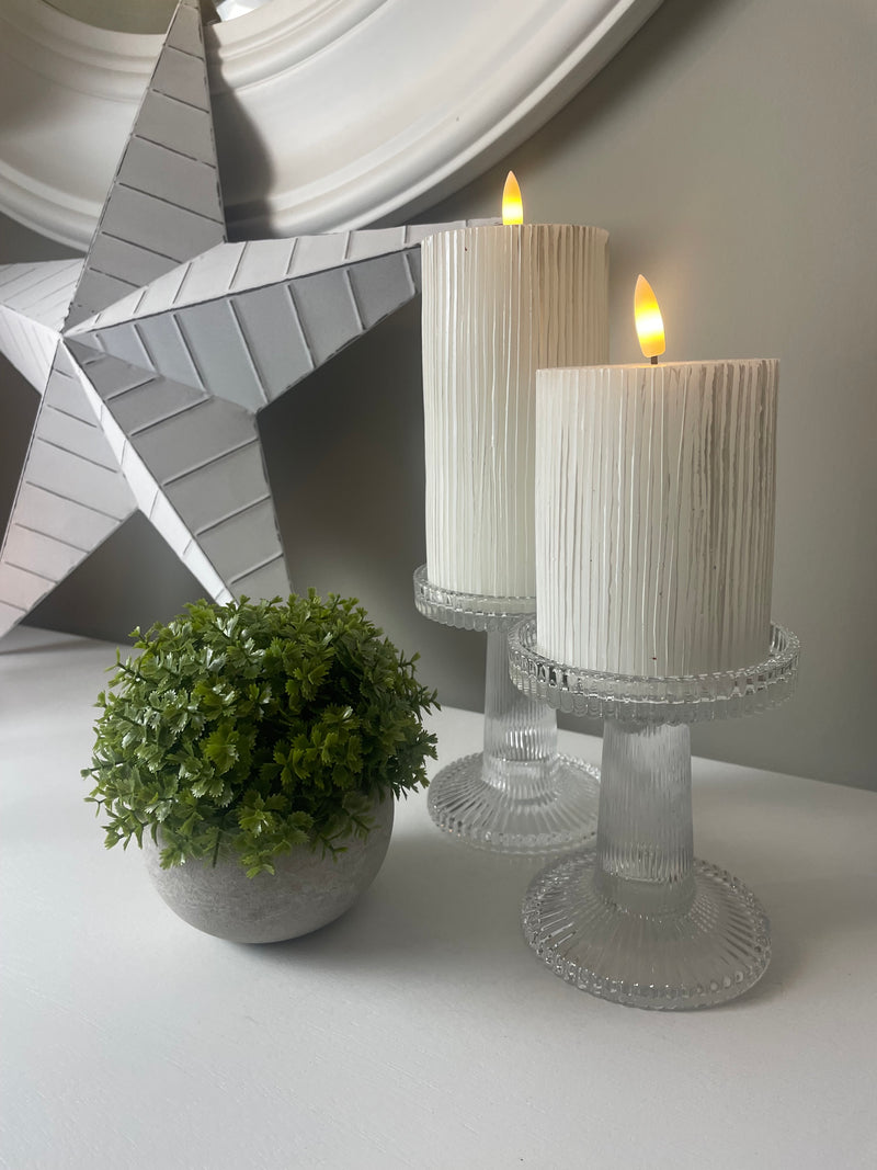 Pair of ribbed glass candle sticks holders