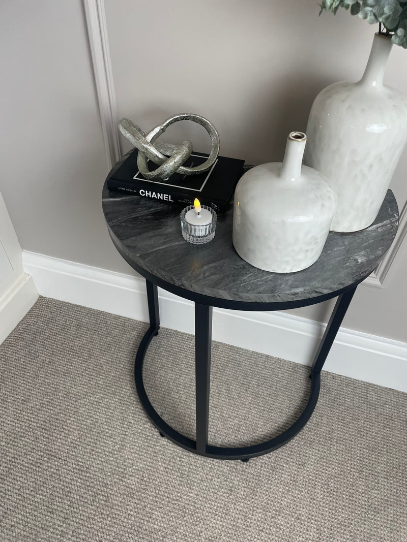 Black marble look top half moon table