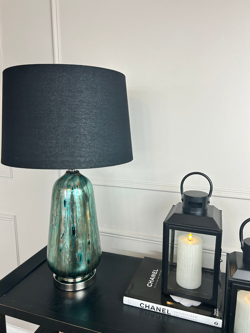 Blue and silver abstract peacock glass lamp with black shade