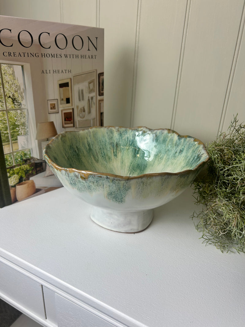 Green decorative ombré bowl on foot stand