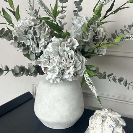 Bouquet arrangement grey/taupe hydrangeas white Veronica eucalyptus bunch.