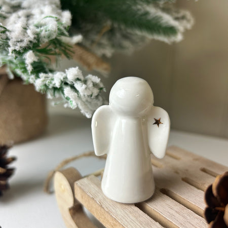 Ceramic angel with Gold Star wing 6cm