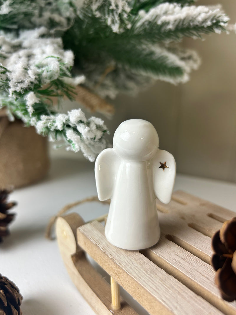 Ceramic angel with Gold Star wing 6cm