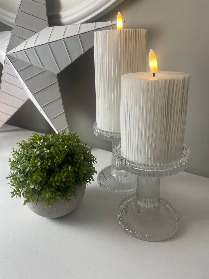 Pair of ribbed glass candle sticks holders