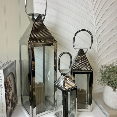 Set of three hammered chrome metal lantern