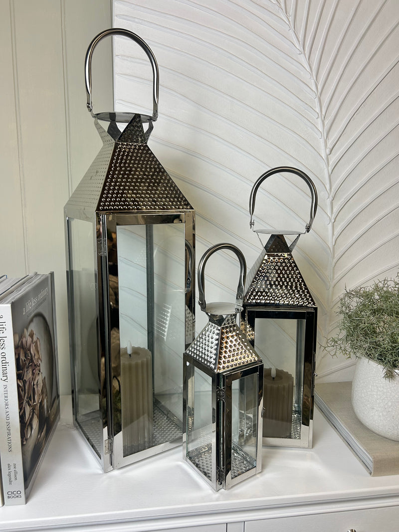 Set of three hammered chrome metal lantern