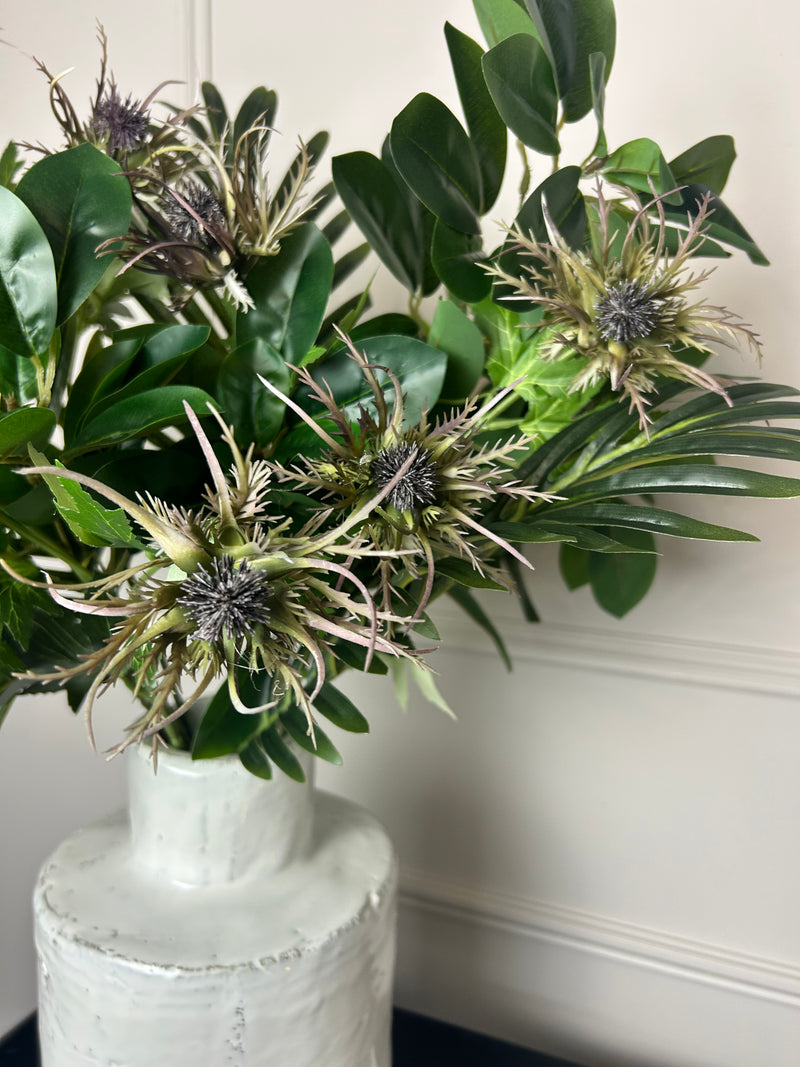 Green tall reed, green sorghum grass and mocha oyster alexis stem arrangement