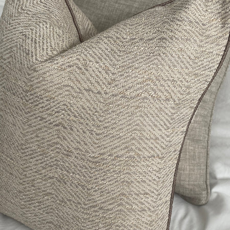 Taupe gold ripple textured cushion with piping