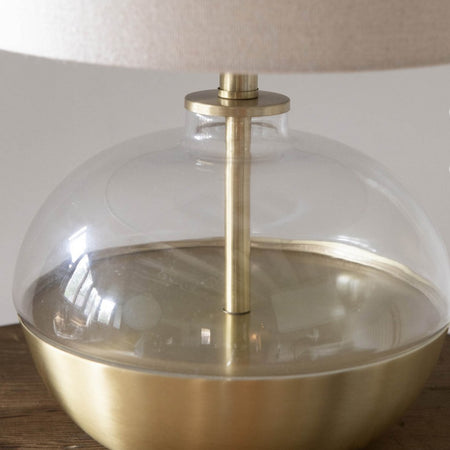 Gold glass round squat lamp with linen shade