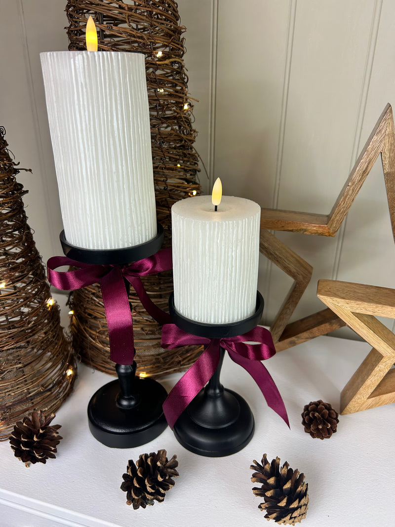 Set of Two Tall staggered height Black Metal Candlesticks 23cm