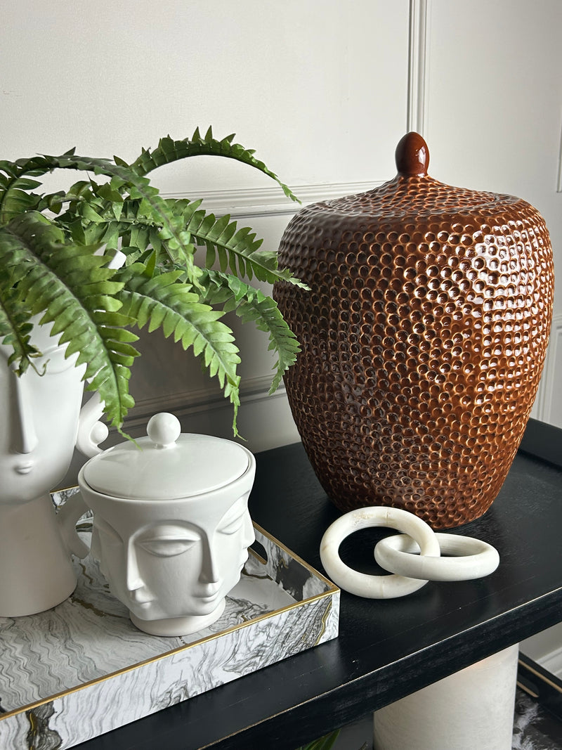 White faces ceramic lidded jar