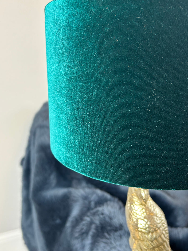 Gold parrot lamp with emerald green shade