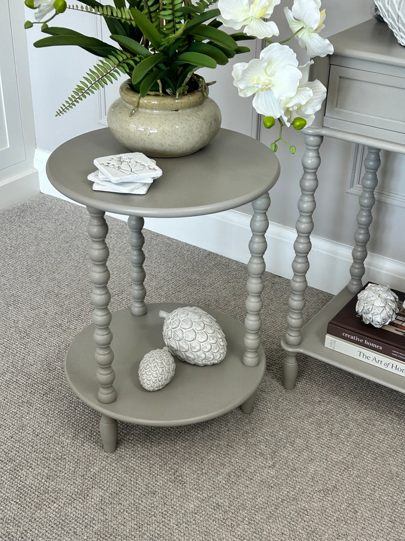 Neutral taupe round side table textures beaded leg