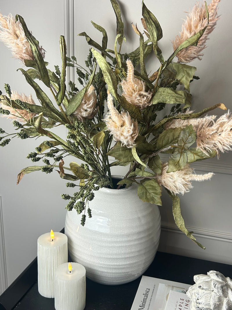 Green tall reed, green sorghum grass and mocha oyster alexis stem arrangement