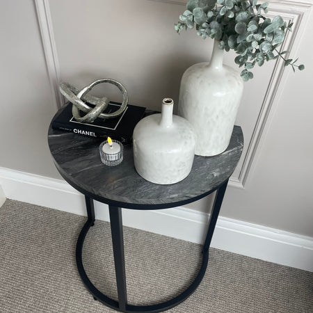 Black marble look top half moon table