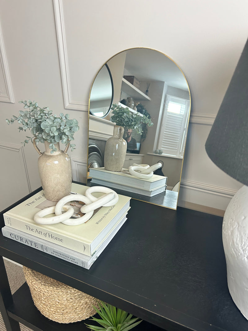 Gold arched metal mirror 50x30