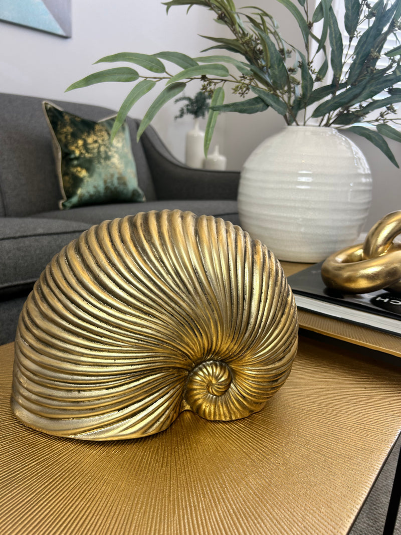 Gold sea snail shell ornament
