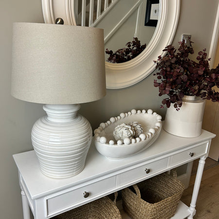 White ceramic ribbed lamp with shade