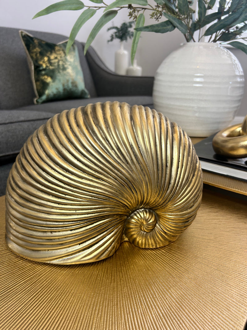 Gold sea snail shell ornament
