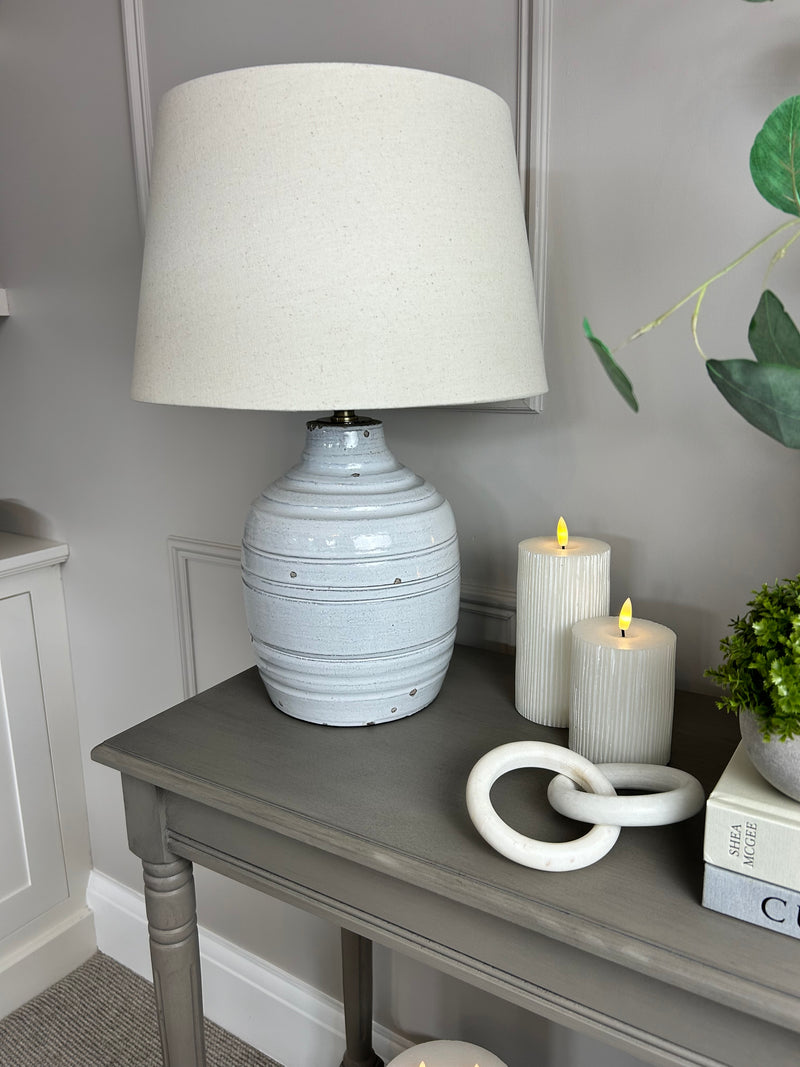 Thalia stone distressed lamp with linen shade