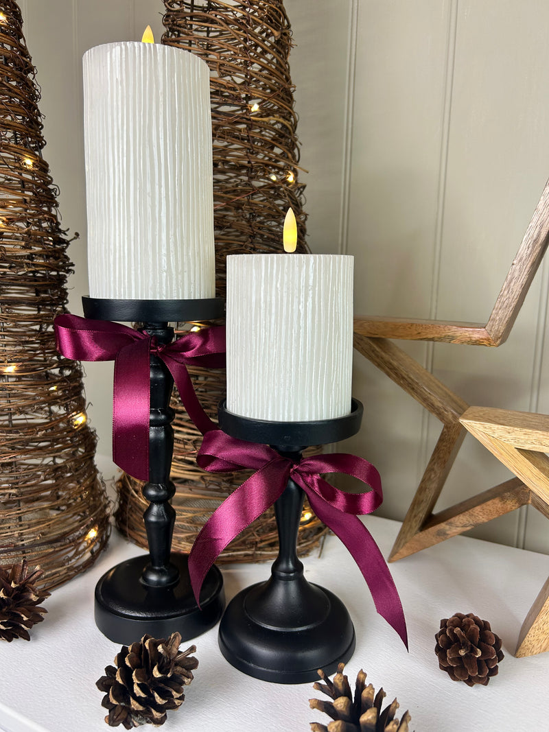 Set of Two Tall staggered height Black Metal Candlesticks 23cm