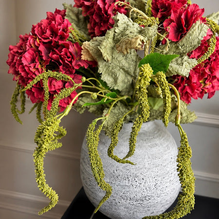 Green catkin trailing stem