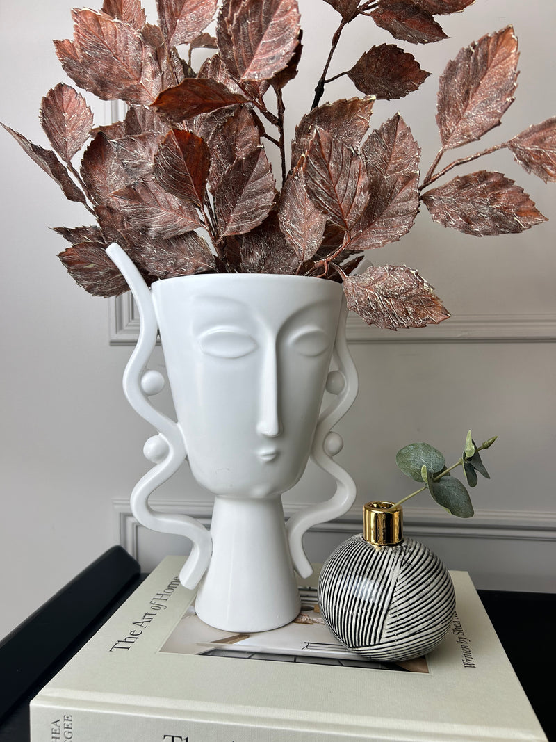 Ceramic white face urn vase