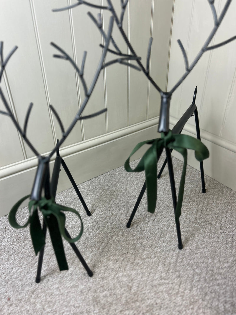 Set of two black metal reindeers 67cm
