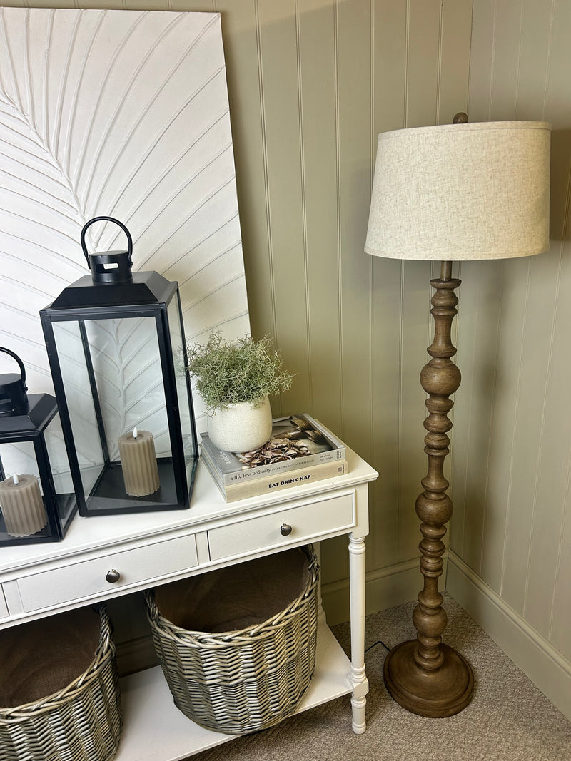 Wooden shaped floor lamp with linen shade